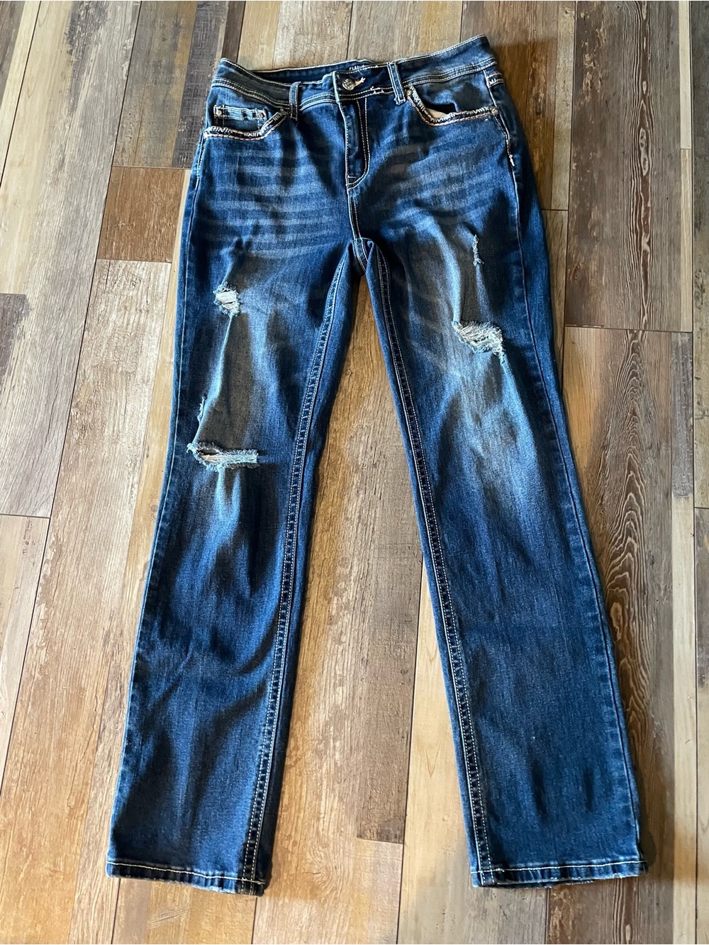 Women’s Distressed Dark Blue Jeans